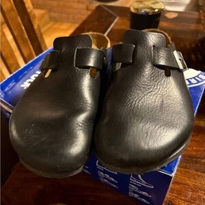 Birkenstock 
Black Leather Slip-On Clogs